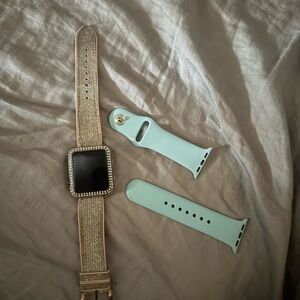 Smartwatch with Gold and Mint Bands